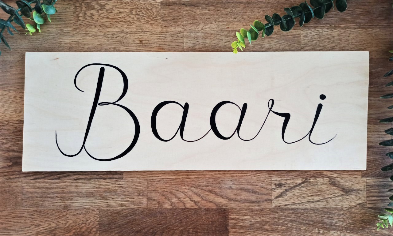 Vanerinen baari -kyltti